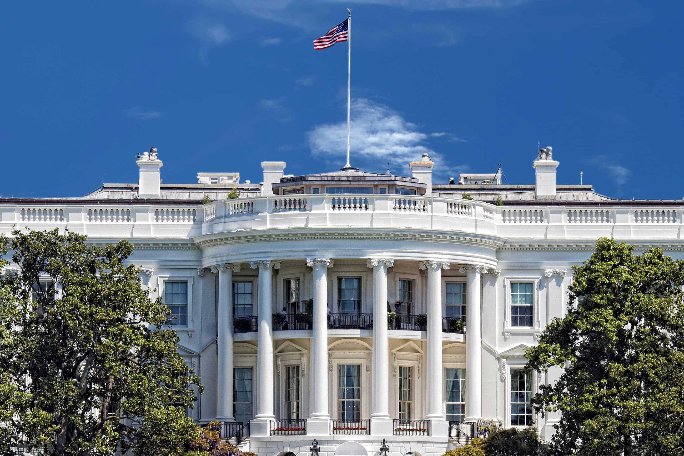 CMS ALT TEXT White House on deep blue sky background
